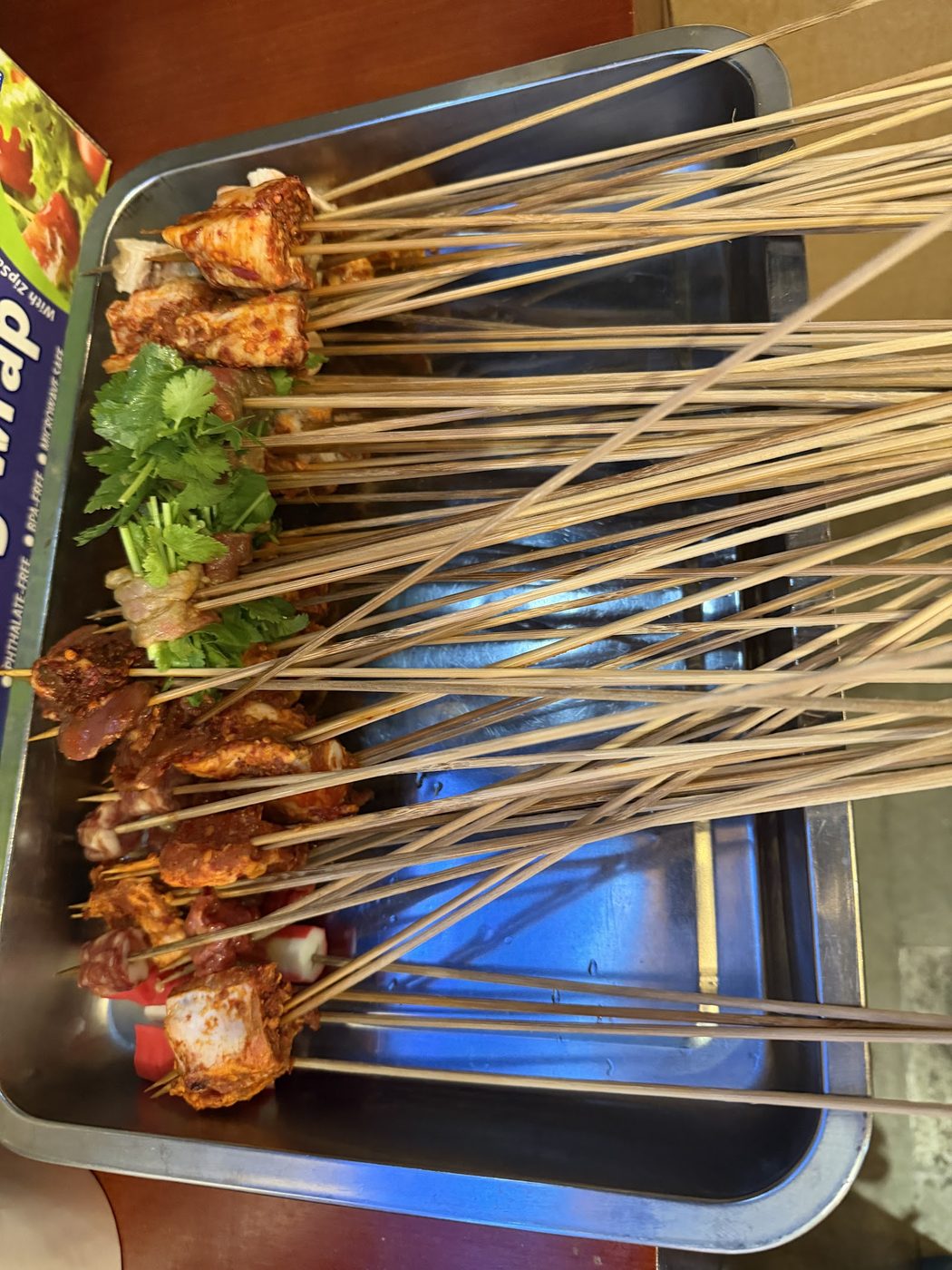 Skewers arranged on a tray